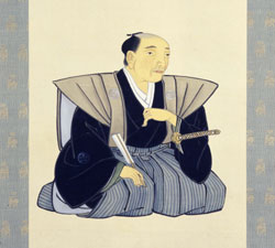 間重富像